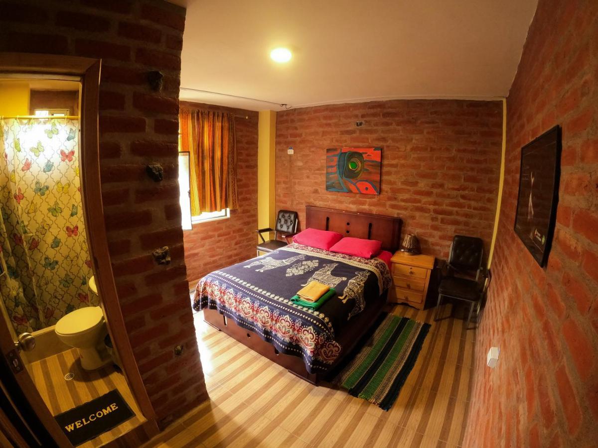 بانيوس Hostal La Casa Amarilla City المظهر الخارجي الصورة