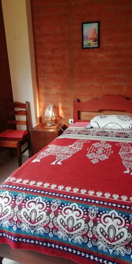 بانيوس Hostal La Casa Amarilla City المظهر الخارجي الصورة
