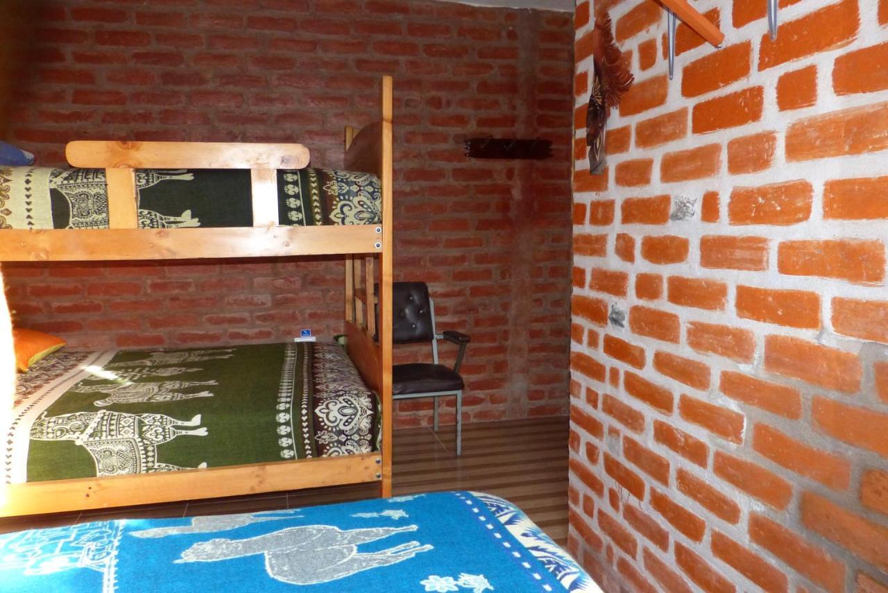 بانيوس Hostal La Casa Amarilla City المظهر الخارجي الصورة