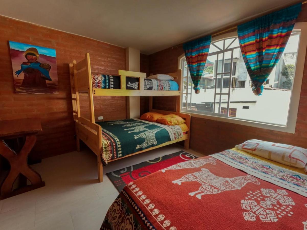 بانيوس Hostal La Casa Amarilla City المظهر الخارجي الصورة