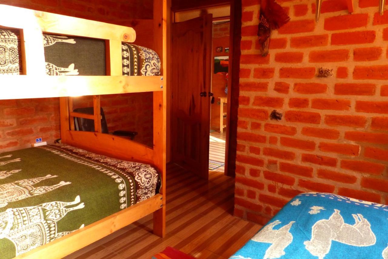 بانيوس Hostal La Casa Amarilla City المظهر الخارجي الصورة