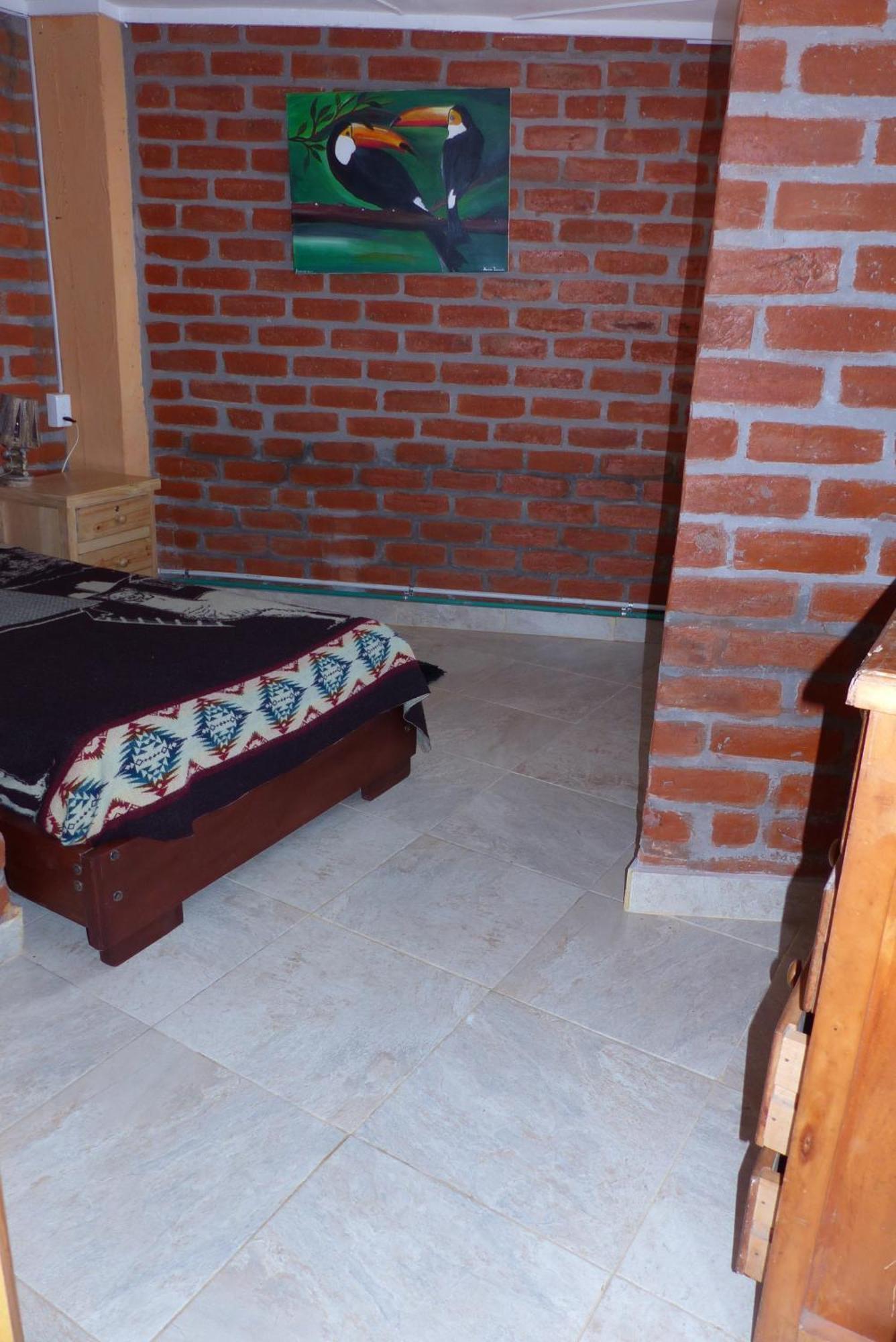بانيوس Hostal La Casa Amarilla City المظهر الخارجي الصورة