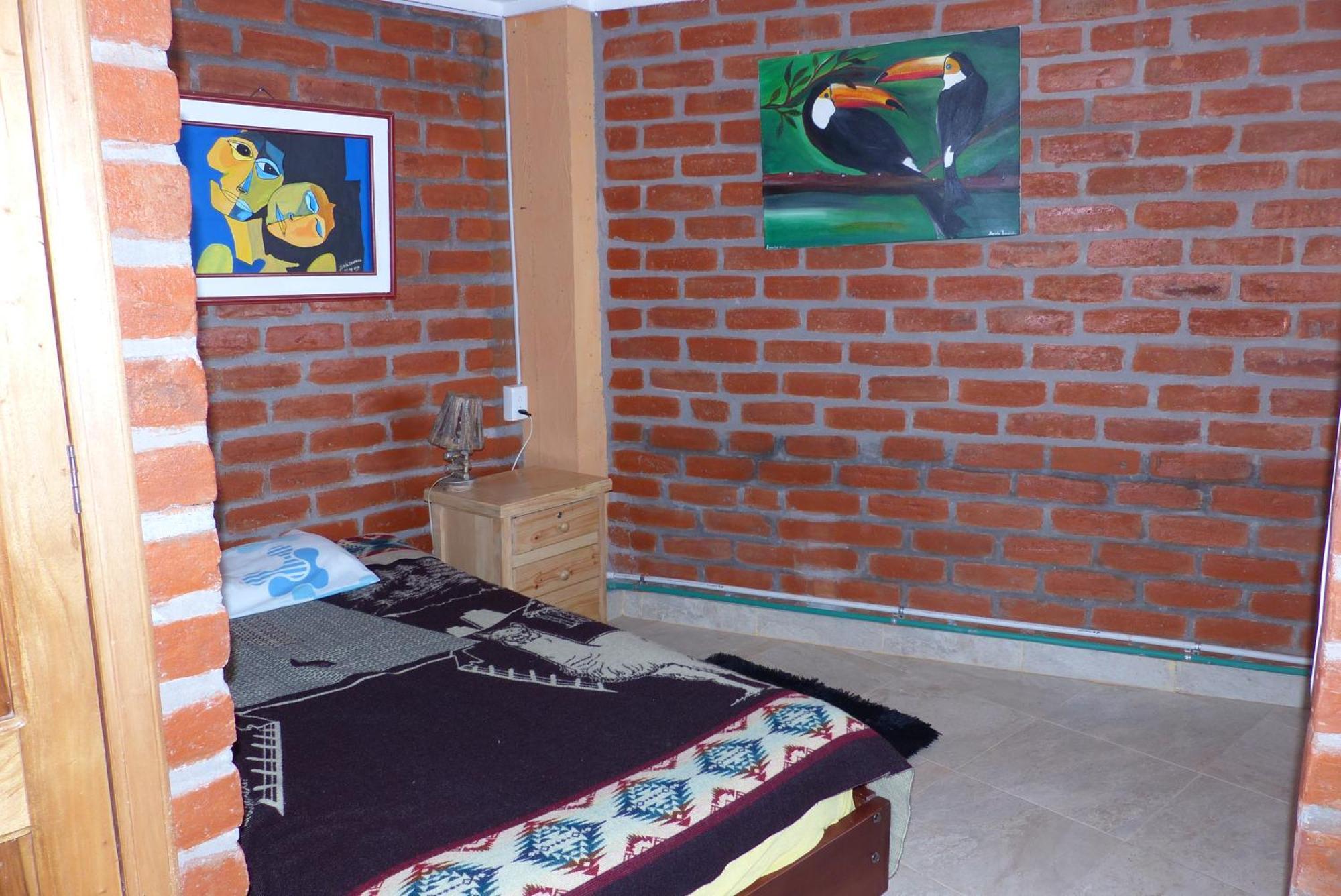 بانيوس Hostal La Casa Amarilla City المظهر الخارجي الصورة