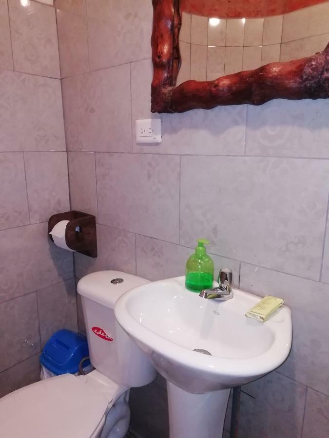 بانيوس Hostal La Casa Amarilla City المظهر الخارجي الصورة