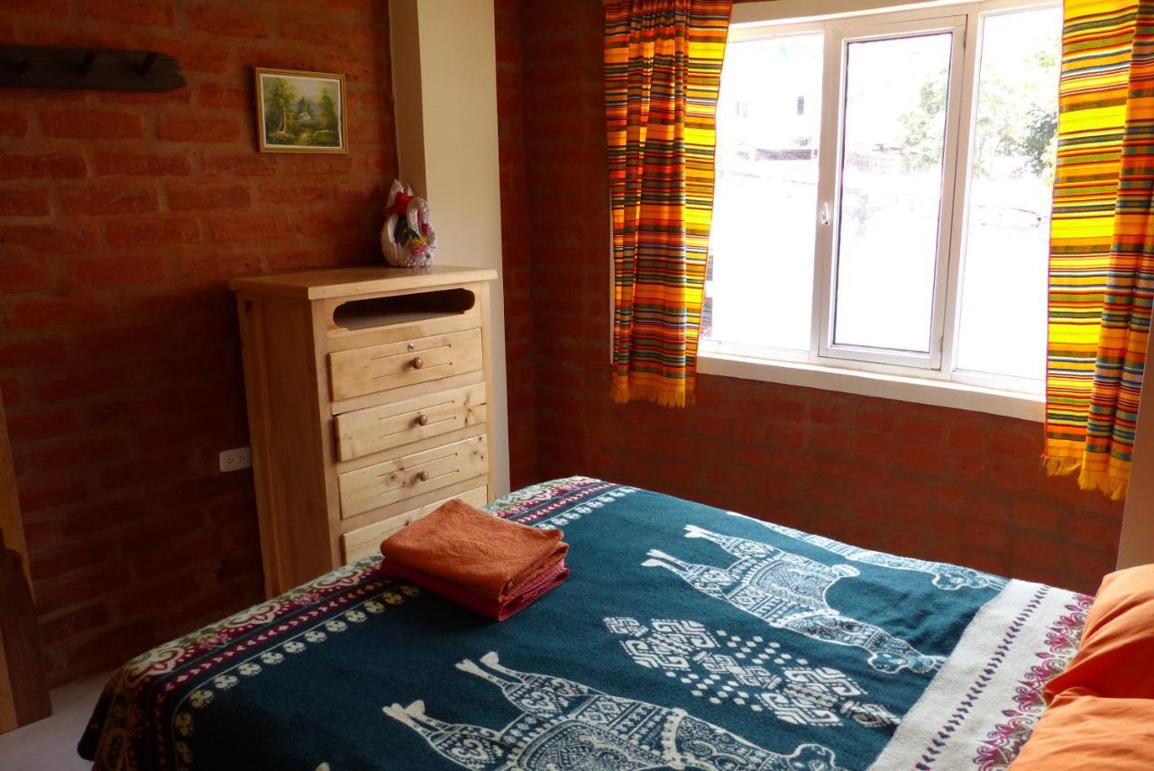 بانيوس Hostal La Casa Amarilla City المظهر الخارجي الصورة