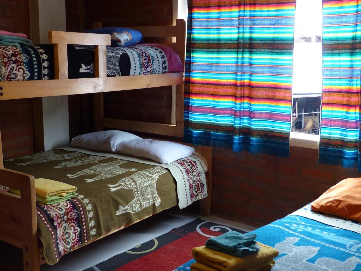 بانيوس Hostal La Casa Amarilla City المظهر الخارجي الصورة